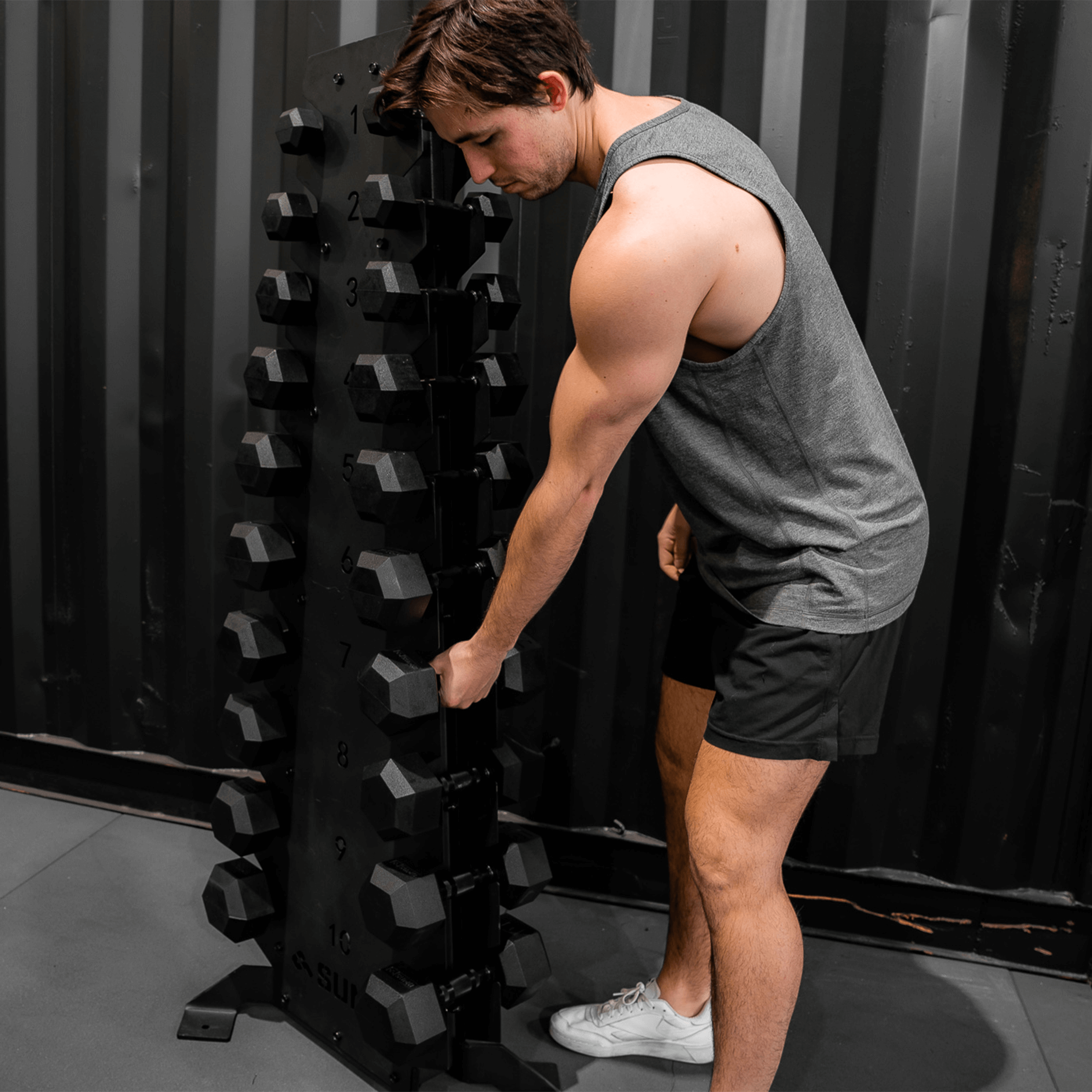 Premium 10 Pair Black Hex Dumbbell Set (in use)